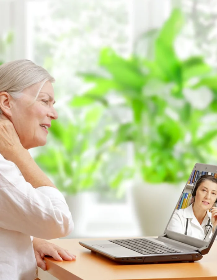 lady in having an online consultation at her laptop