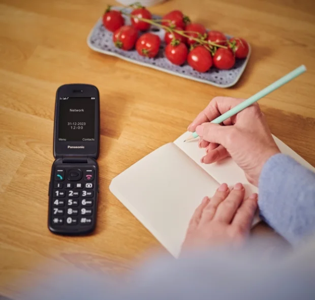 panasonic flip phone on table